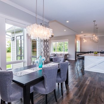 Excel Homes - a dining room with a view of the backyard - General Contractors Near Me - Rochester, Minnesota Excel Homes - a dining room with a view of the backyard - General Contractors Near Me - Rochester, Minnesota
