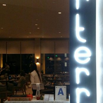 Arterra Restaurant and Bar - Neon sign at the hostess stand - Asian Fusion Near Me - San Diego, California Arterra Restaurant and Bar - Neon sign at the hostess stand - Asian Fusion Near Me - San Diego, California