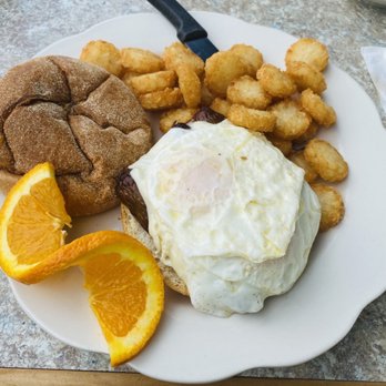 The Jellyfish Cafe - Sausage egg and cheese with over easy egg and tater tots - American Near Me - Wildwood Crest, New Jersey The Jellyfish Cafe - Sausage egg and cheese with over easy egg and tater tots - American Near Me - Wildwood Crest, New Jersey
