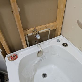 R N T Plumbing and Heating - A professional bathtub installation completed for a new residential construction project. - Plumbing Near Me - Calgary, Alberta R N T Plumbing and Heating - A professional bathtub installation completed for a new residential construction project. - Plumbing Near Me - Calgary, Alberta