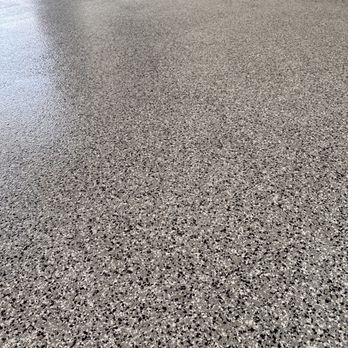 Epoxy Masters - We went with the tuxedo color! He also added in texture so its not slippery when walking. Absolutely love this floor!!! - Flooring Near Me