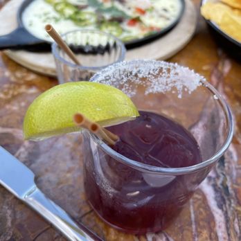 Tope - Sickening sweet Marionberry margarita. The gelatinous queso dip in the background. - Bars Near Me - Portland, Oregon Tope - Sickening sweet Marionberry margarita. The gelatinous queso dip in the background. - Bars Near Me - Portland, Oregon