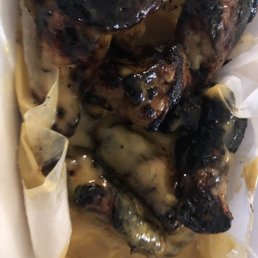 Flavorless burnt overpriced grilled wings in honey mustard. I'm just glad I didn't get the 14 piece.
