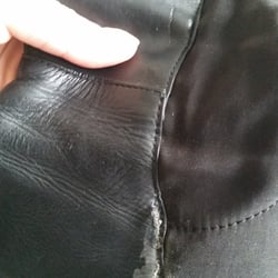 Custom Shoe Repair - this is their glue job... glue everywhere... very unprofessional.