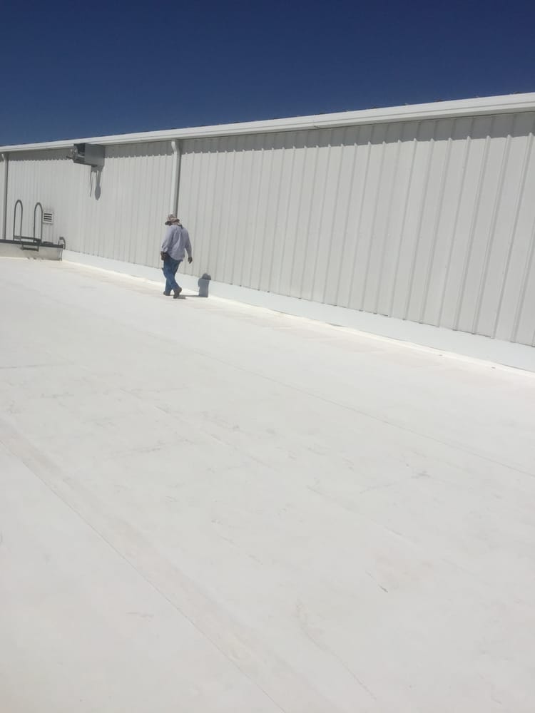 Slide of Longhorn Commercial Roofing