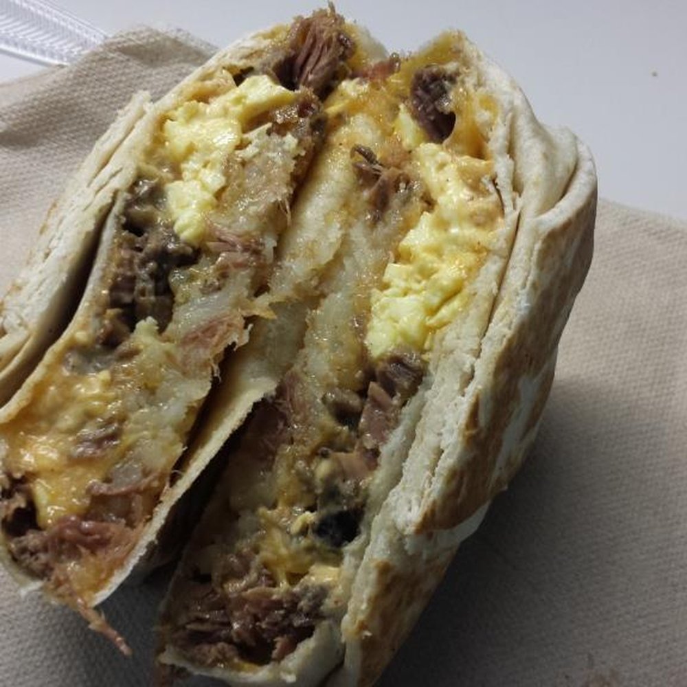 Taco Bell - Crunch wrap cut in half from Taco Bell - Fast Food Near Me - Columbia, Maryland Taco Bell - Crunch wrap cut in half from Taco Bell - Fast Food Near Me - Columbia, Maryland