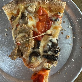 Wicked Pie Pizza - Slice from a small pie - Pizza Near Me - Puyallup, Washington Wicked Pie Pizza - Slice from a small pie - Pizza Near Me - Puyallup, Washington