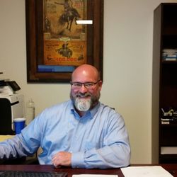 Jones Kimball Law Firm - David Jones working at his desk in the office.