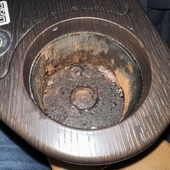 Studio Movie Grill - Cup holder. Lord knows how long this has been there. - Cinema Near Me - Seminole, Florida Studio Movie Grill - Cup holder. Lord knows how long this has been there. - Cinema Near Me - Seminole, Florida