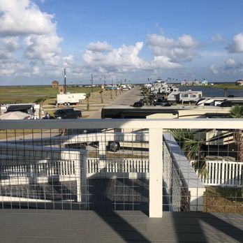 Bluewater RV Resort - View to the entrance from bathhouse - RV Parks Near Me - Freeport, Texas