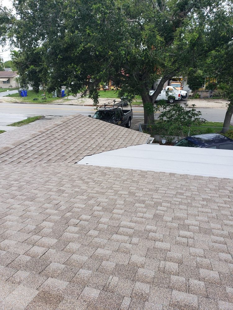 Slide of Rick's Roofing and Repairs