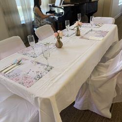 Carefield Pleasanton Memory Care - Piano performer and white table linens (with pink bows!) for Mother's Day brunch