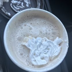 Stop putting whip cream on the lid instead of in cup. whip cream sticks to lid falls off all over everything