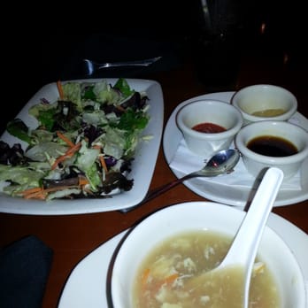 P.F. Chang's - Im used to seeing yellow egg drop soup, not brownish. Salad has a "interesting" dressing - Chinese Near Me - Winter Park, Florida