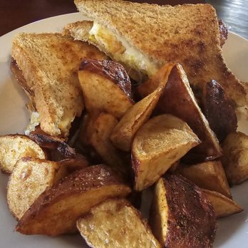 Belfast Station - Bacon and egg sandwich with potatoes - Irish Pub Near Me - Sussex, Wisconsin Belfast Station - Bacon and egg sandwich with potatoes - Irish Pub Near Me - Sussex, Wisconsin