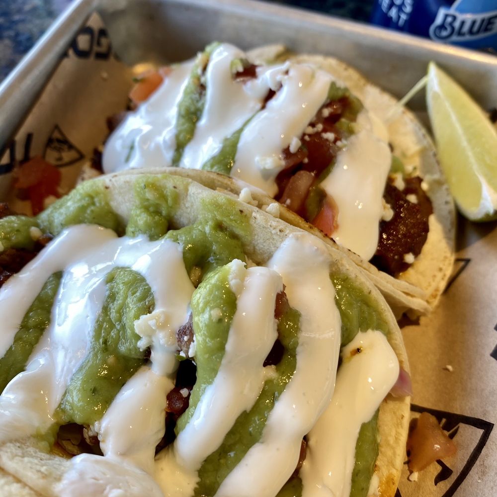 Topgolf - Tres Tacos - Steak ($11) 780 calories | little soggy for me, I think if they held back on the sauce a bit it could be a good bar snack! - Golf Near Me - Charlotte, North Carolina Topgolf - Tres Tacos - Steak ($11) 780 calories | little soggy for me, I think if they held back on the sauce a bit it could be a good bar snack! - Golf Near Me - Charlotte, North Carolina