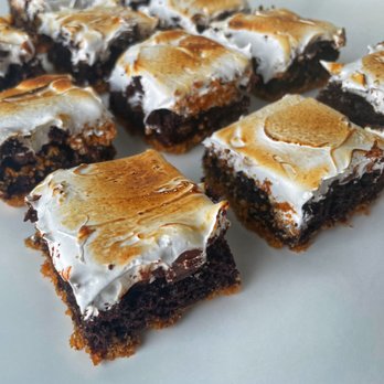 The Crumb Keeper - S'mores brownies made with a graham cracker crust, double chocolate brownie and a toasted from scratch marshmallow fluff. - Desserts Near Me - Aurora, Colorado The Crumb Keeper - S'mores brownies made with a graham cracker crust, double chocolate brownie and a toasted from scratch marshmallow fluff. - Desserts Near Me - Aurora, Colorado