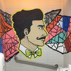 Tittos Latin BBQ & Brew - Restroom art - I suppose this is Titto?