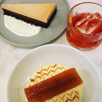 Jolie Restaurant - Chocolate tarte and gateau aux pommes - the tarte was my favorite! The drink is the la belle epoque (basically an old fashioned) - French Near Me - Raleigh, North Carolina Jolie Restaurant - Chocolate tarte and gateau aux pommes - the tarte was my favorite! The drink is the la belle epoque (basically an old fashioned) - French Near Me - Raleigh, North Carolina