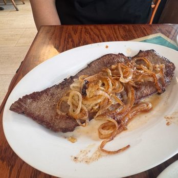 Puerto Sagua Restaurant - Steak with onions like this?? Yeah... somebody's abuela back there - Cuban Near Me - Miami Beach, Florida