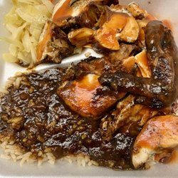 Tropical Krust - Best Jerk Chicken in New Haven! Jerk chicken, rice and peas with oxtail gravy and cabbage.