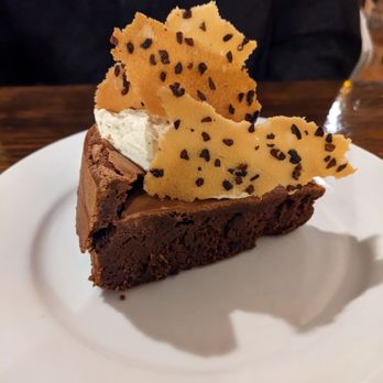 Il Nido - Flourless chocolate cake - Italian Near Me - Seattle, Washington Il Nido - Flourless chocolate cake - Italian Near Me - Seattle, Washington