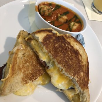 Water Tower Kitchen - Grilled cheese with bacon, aged white , yellow cheddar serve with tomato bisque. - New American Near Me - Campbell, California