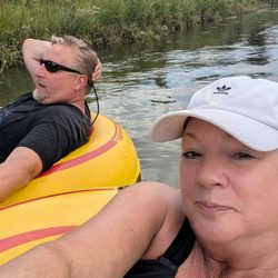 Adventure West River Tube Rentals and Shuttle - Husband and I chillin.