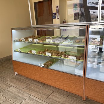 Donut Empire - a display case filled with donuts - Donuts Near Me - Round Rock, Texas