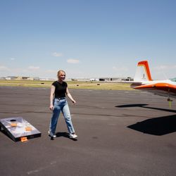 A Wings Over the Rockies Exploration of Flight attendant plays yard games.