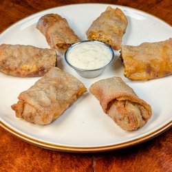 Krootz Brewing Company - Brunch Breakfast Egg Rolls - fried eggrolls stuffed with sausage, bacon, cheese and onions.  Side of homemade gravy for dipping.
