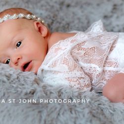 8 day old baby girl. I love shooting newborns within the first 14 days of life whenever possible.