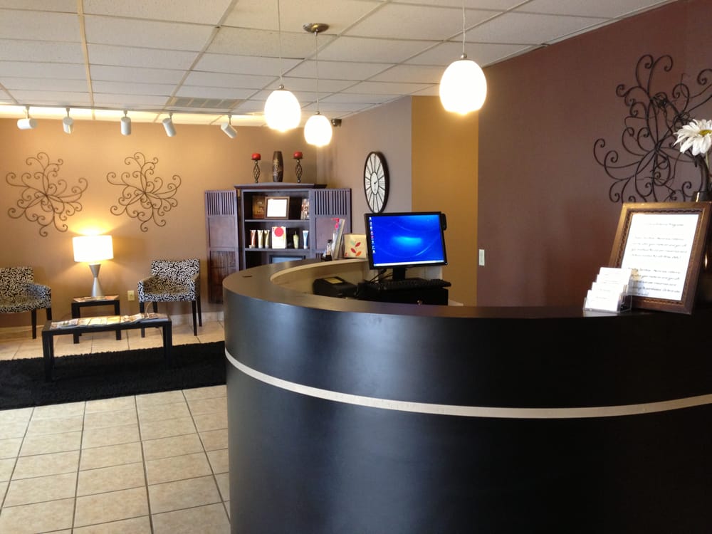 Reflexions Salon & Spa Logo