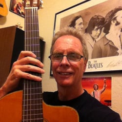 Guitar Lessons with Bill Schrey - Selfie in my teaching office with my Takamine classical guitar