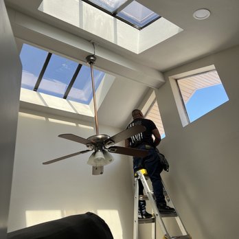 Mikes Tint Shop - Worker adding the tint on my windows. Amazing work!! - Home Window Tinting Near Me - Orange, California Mikes Tint Shop - Worker adding the tint on my windows. Amazing work!! - Home Window Tinting Near Me - Orange, California