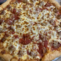 Large double crust sausage pizza extra sauce !!! Delicious