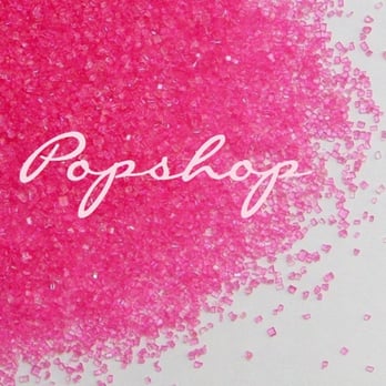 Popshop Bakery - the word popshop surrounded by pink glitter - Caterers Near Me Popshop Bakery - the word popshop surrounded by pink glitter - Caterers Near Me