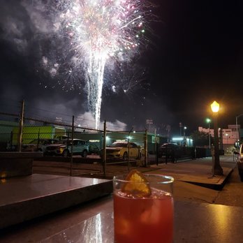 Modernist - Fireworks from the Grizzlies game across the street. - Cocktail Bars Near Me - Fresno, California Modernist - Fireworks from the Grizzlies game across the street. - Cocktail Bars Near Me - Fresno, California