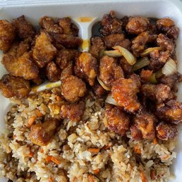 Half general Tao and orange chicken with fried rice