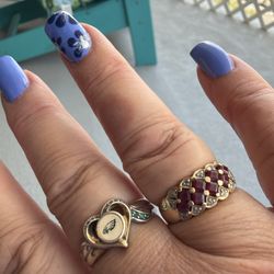 Jackie's Nails - Periwinkle gel with navy blue and white flower art.