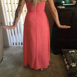 Je T'aime Bridal and Women's Boutique - Too short in the back and too tight in the chest.... hello heels