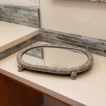 Terry Krause Tile - Bathroom remodel included new paint and quartz countertops. - General Contractors Near Me