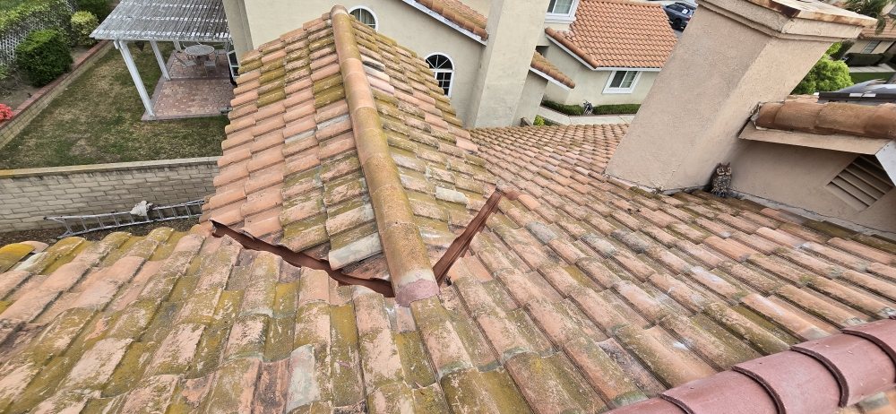 Slide of Kalli Roofing