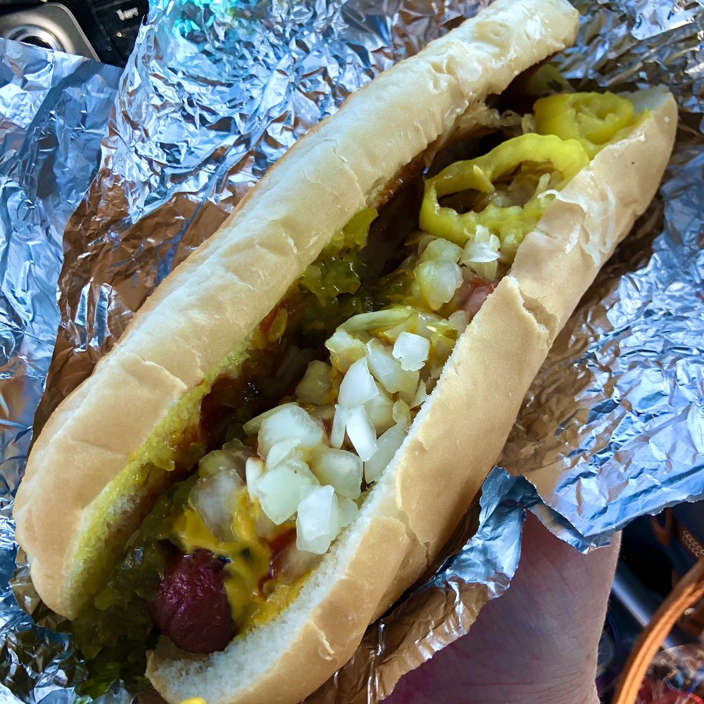 polish dog with half mustard, ketchup, onions, relish and half sauerkraut, special sauce, banana peppers.