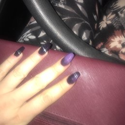 Changes color based on temperature. Yes, I stuck my nail in my mouth to test it