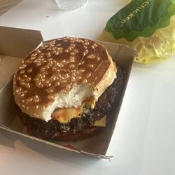 Bite taken out of bun and its very burnt