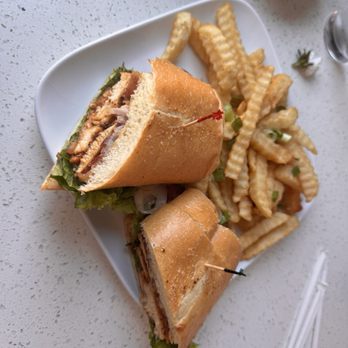 Reyes Cafe & Grill - Cajun Fire Chicken Sandwich with Garlic Fries, you'll be hooked by the flavors. - Cafes Near Me - San Jose, California Reyes Cafe & Grill - Cajun Fire Chicken Sandwich with Garlic Fries, you'll be hooked by the flavors. - Cafes Near Me - San Jose, California