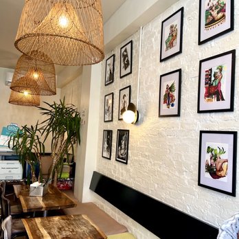 Lakou Cafe - tables and chairs in a restaurant - Vegan Near Me - Brooklyn, New York Lakou Cafe - tables and chairs in a restaurant - Vegan Near Me - Brooklyn, New York