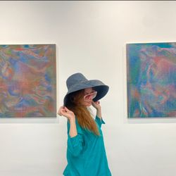 The Chambers Project - Artist Jessica Brugnon in front of Candace Thatcher paintings.