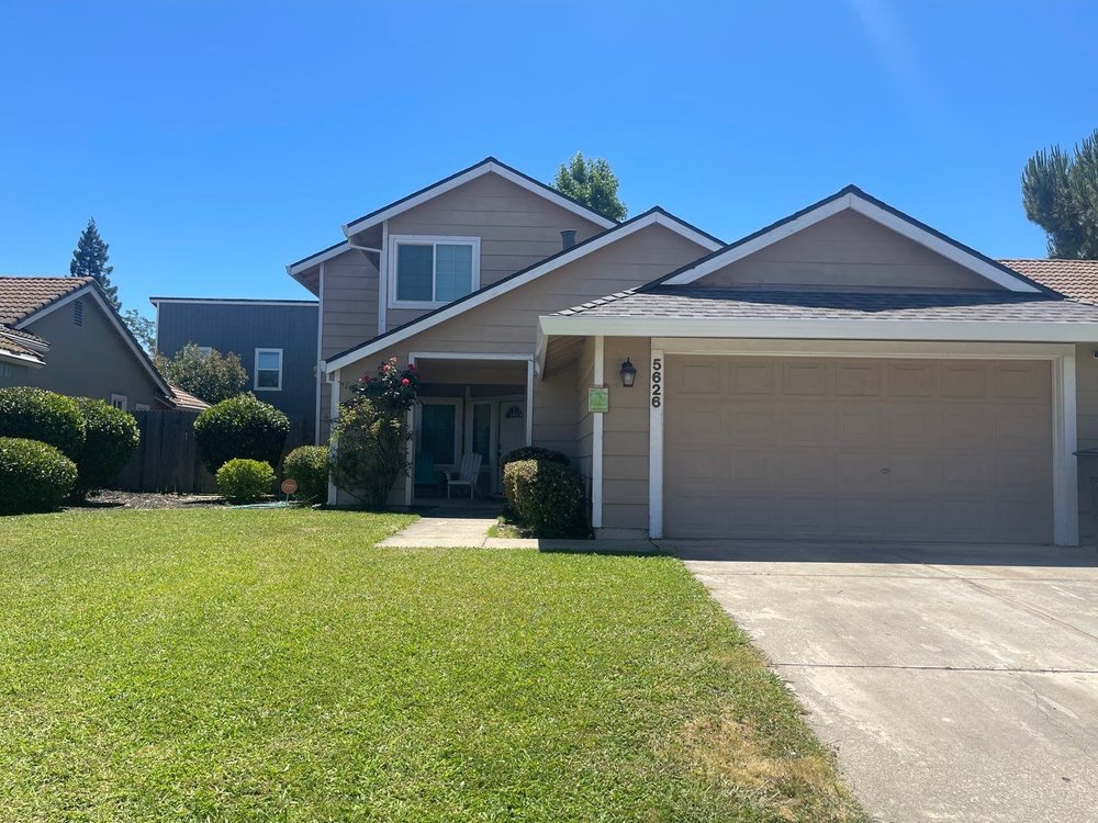 Slide of Harlan Quality Roofing